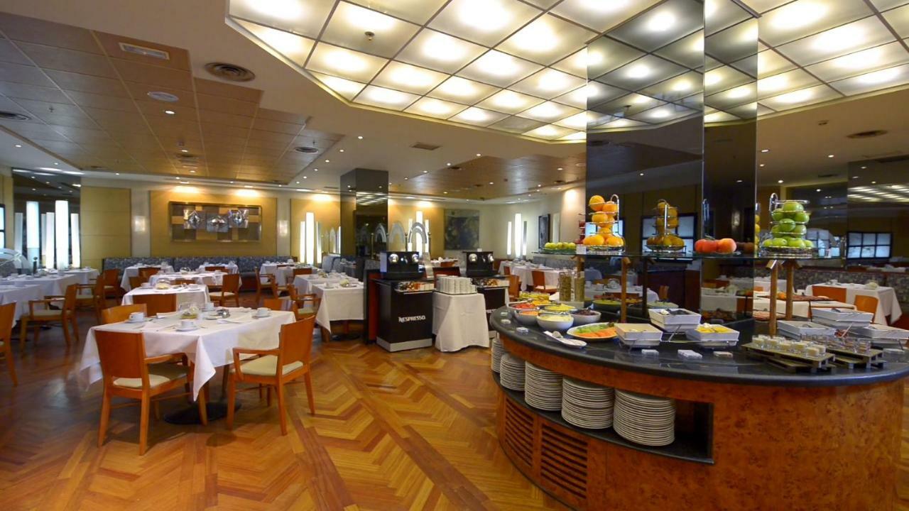 Hotel Miguel Angel Madrid Exteriör bild The restaurant