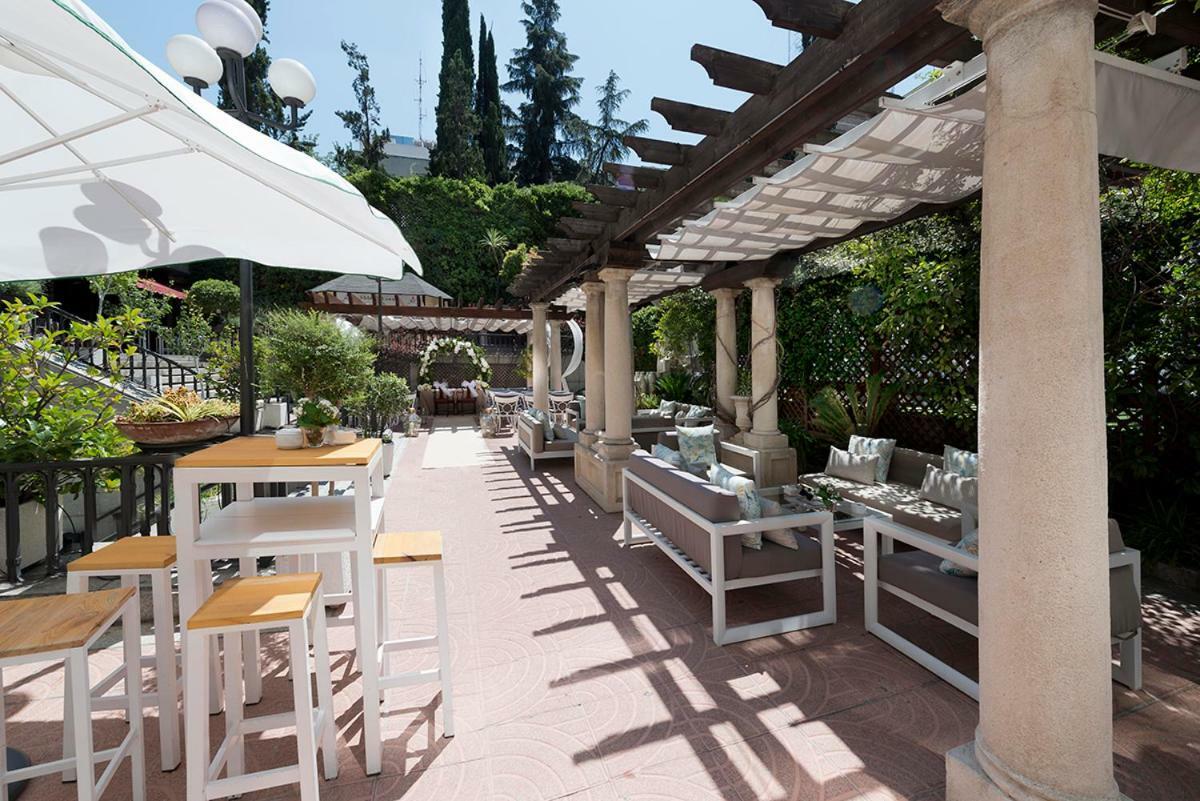 Hotel Miguel Angel Madrid Exteriör bild The Terrace