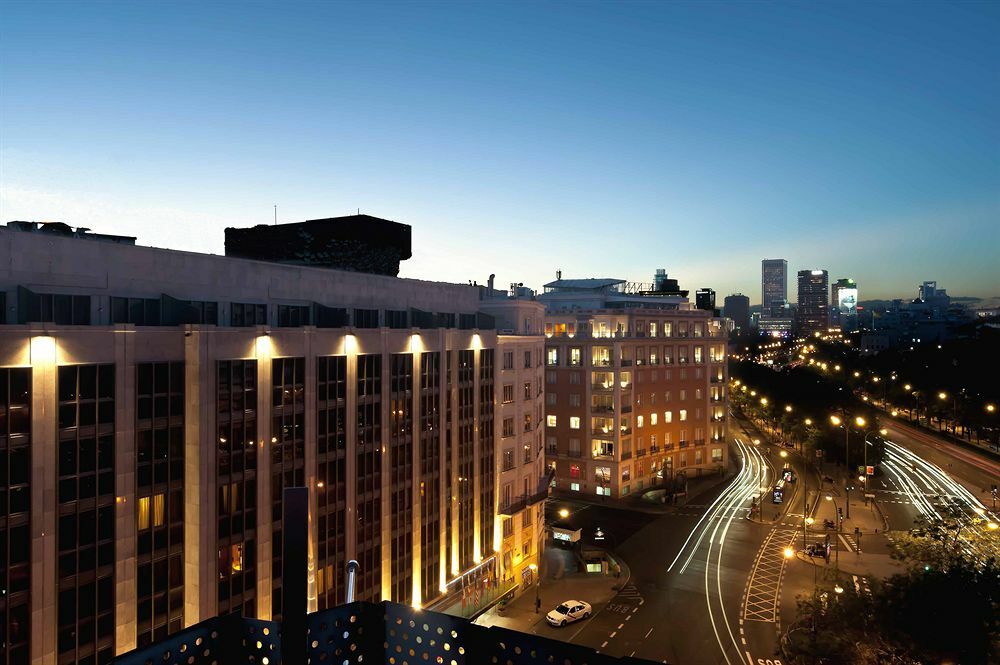 Hotel Miguel Angel Madrid Exteriör bild The building at night